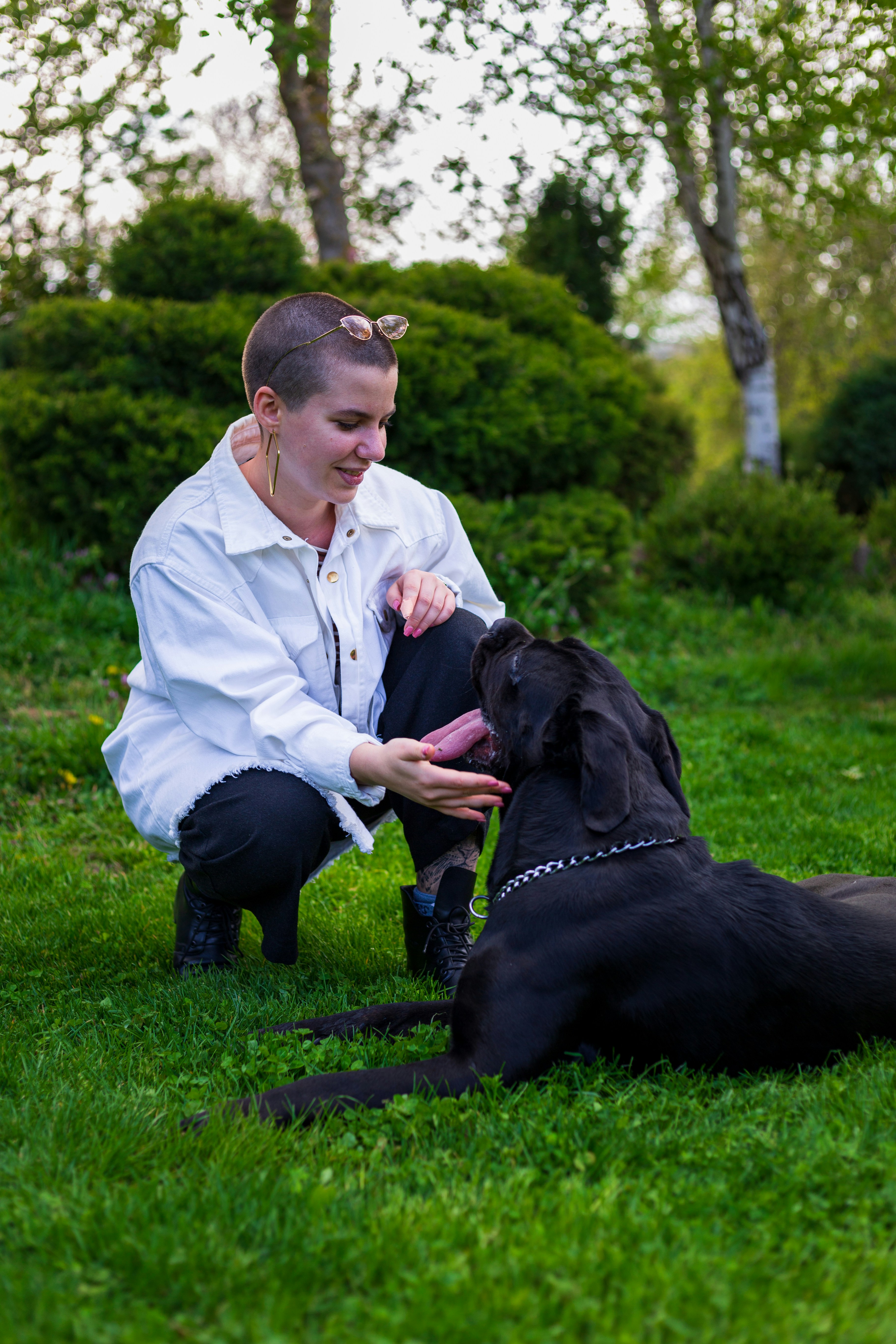 Woman and dog looking at each other